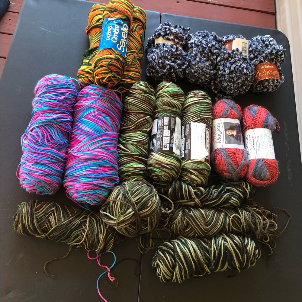 Yarn lot containing 20 full and partial skeins. All 20 included. Crochet yarn